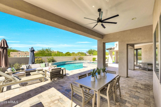 view of patio / terrace with a fenced in pool, outdoor dining area, outdoor lounge area, ceiling fan, and a fenced backyard