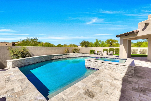 view of pool with a fenced backyard, a patio, a fenced in pool, and an in ground hot tub