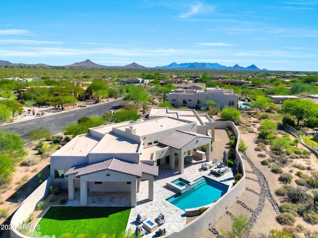 bird's eye view with a mountain view