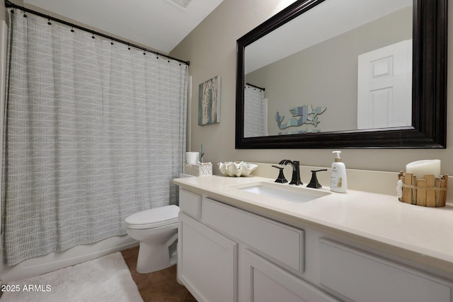 full bath with toilet, vanity, shower / bath combination with curtain, and tile patterned floors