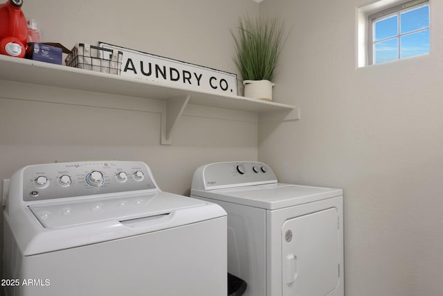 laundry room featuring laundry area and washer and clothes dryer