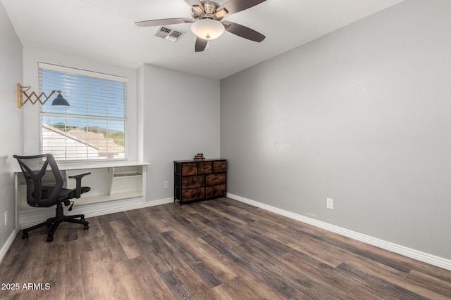 home office featuring dark wood-style flooring, baseboards, and ceiling fan