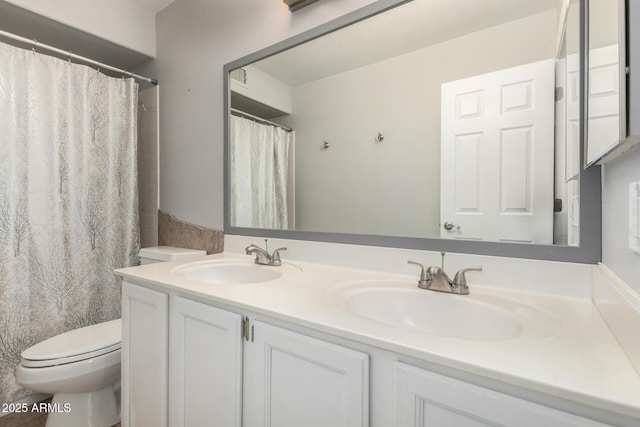 full bath featuring toilet, double vanity, and curtained shower