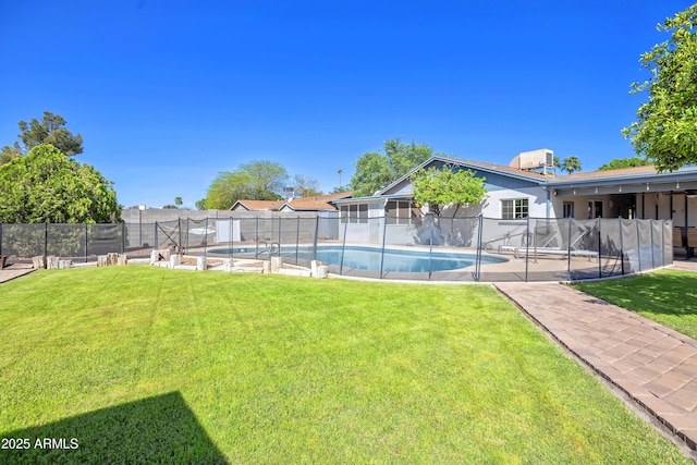 view of yard with a fenced in pool, a patio, and fence