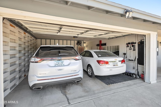 garage featuring driveway