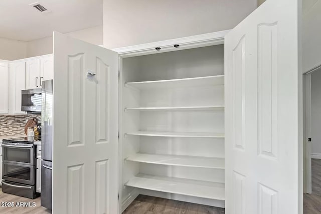 storage area featuring visible vents