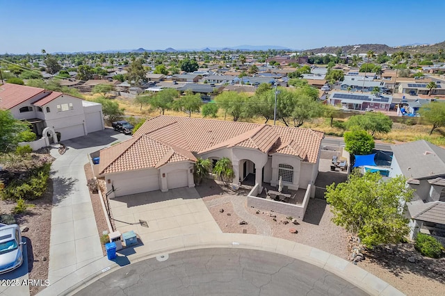 aerial view with a residential view and a mountain view