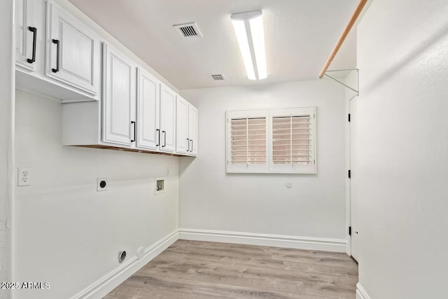 laundry area with washer hookup, baseboards, hookup for an electric dryer, light wood-style floors, and cabinet space