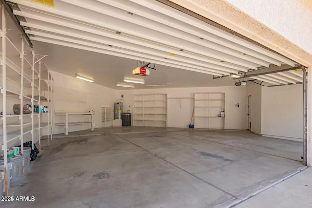 garage with water heater and a garage door opener
