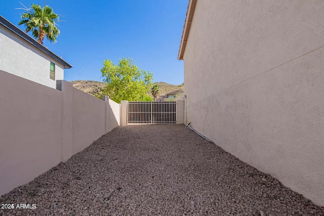 view of yard with a gate and fence