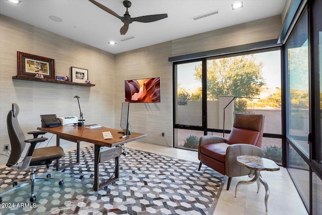 office featuring ceiling fan and light tile patterned floors