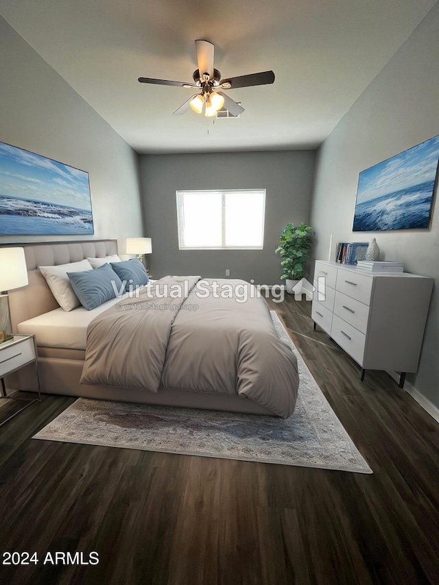 bedroom featuring ceiling fan and dark hardwood / wood-style flooring