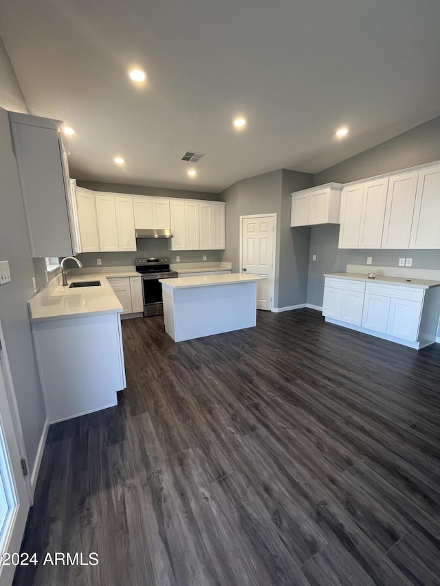 kitchen featuring a center island, sink, dark hardwood / wood-style floors, stainless steel electric stove, and white cabinets