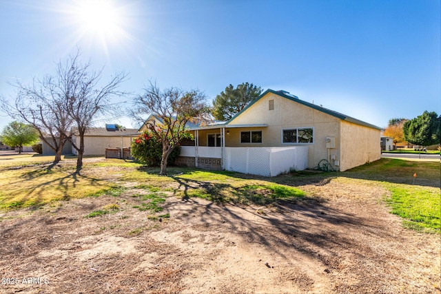 exterior space with a yard