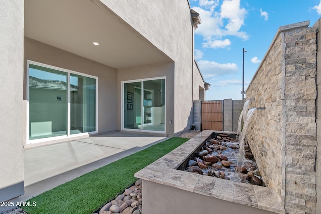 17831 W Mission Ln, Waddell, AZ 85355 - exterior space featuring a patio area, stucco siding, and fence