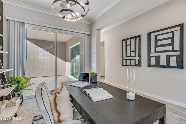 17831 W Mission Ln, Waddell, AZ 85355 - home office featuring baseboards, a notable chandelier, ornamental molding, and wood finished floors