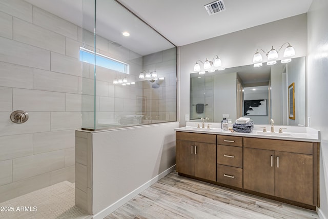 17831 W Mission Ln, Waddell, AZ 85355 - full bath with a sink, a walk in shower, and visible vents