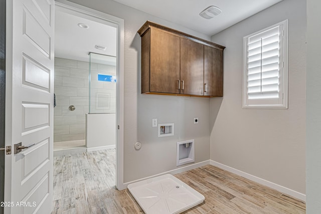 17831 W Mission Ln, Waddell, AZ 85355 - clothes washing area with cabinet space, hookup for a washing machine, baseboards, light wood-type flooring, and hookup for an electric dryer