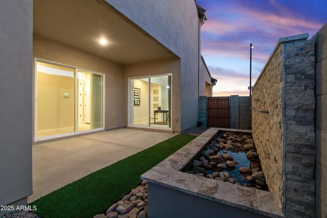17831 W Mission Ln, Waddell, AZ 85355 - view of yard featuring fence, a gate, and a patio area