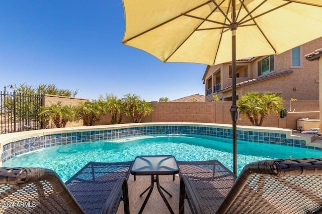 view of pool featuring pool water feature