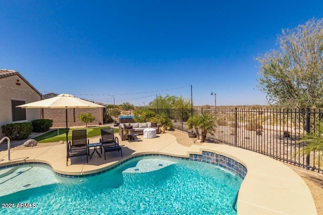 view of pool with a patio area and outdoor lounge area