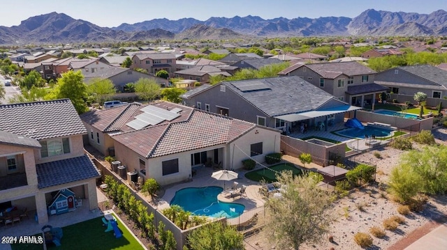 drone / aerial view featuring a mountain view