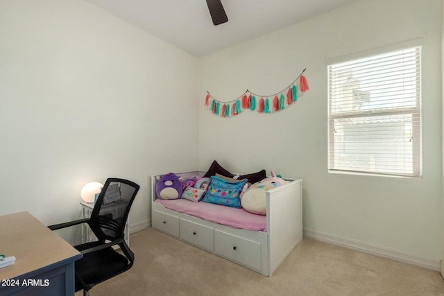 bedroom with ceiling fan and light colored carpet