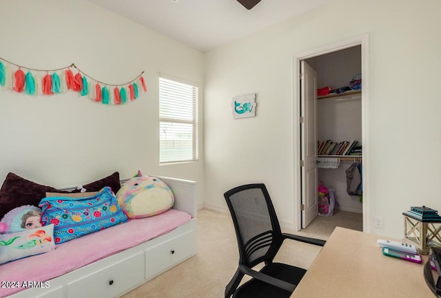 carpeted bedroom with a closet