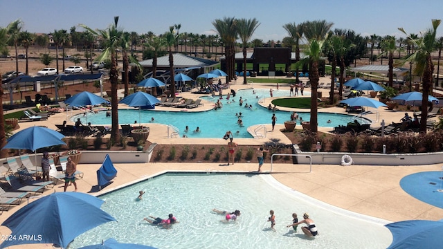 view of swimming pool with a patio and a gazebo