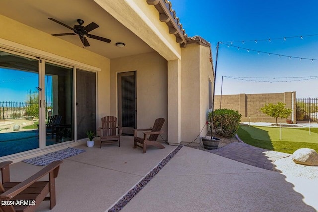 view of patio / terrace with ceiling fan