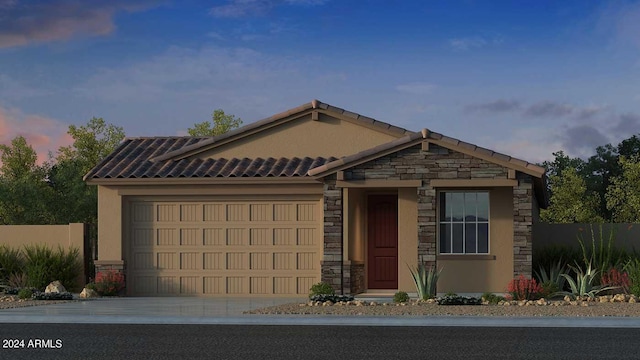 view of front facade featuring a garage, stone siding, driveway, and stucco siding