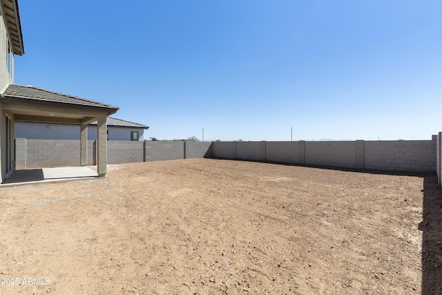 view of yard featuring a fenced backyard