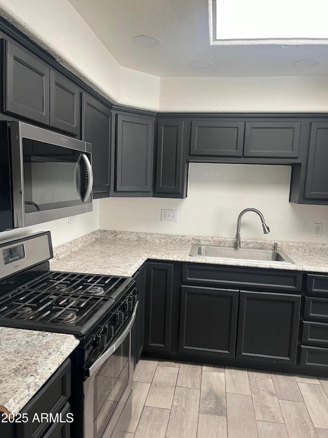 kitchen with stainless steel appliances and sink