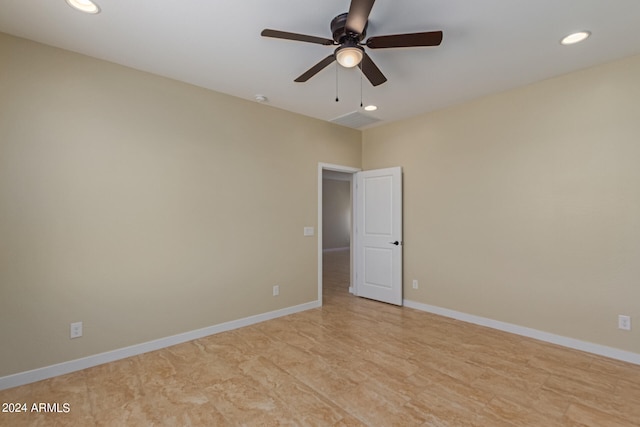 spare room featuring ceiling fan