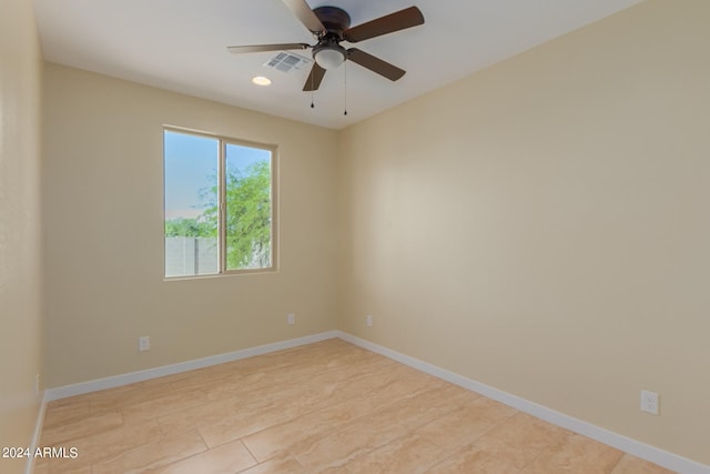 spare room featuring ceiling fan