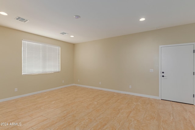 empty room with light wood-type flooring