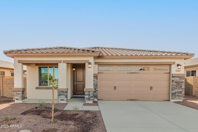 view of front of property with a garage