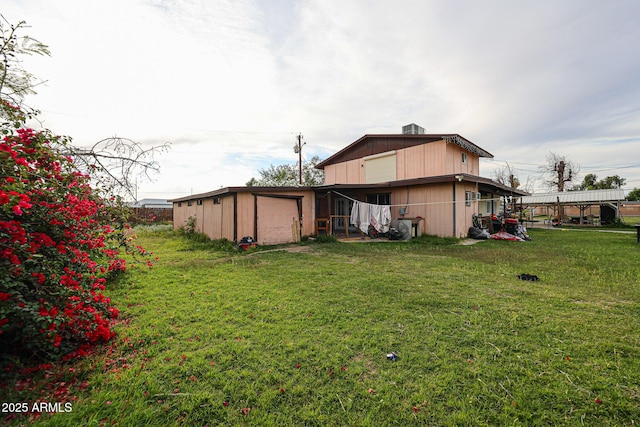 5239 W Maryland Ave, Glendale, AZ 85301 - view of grassy yard with an outbuilding and a garage