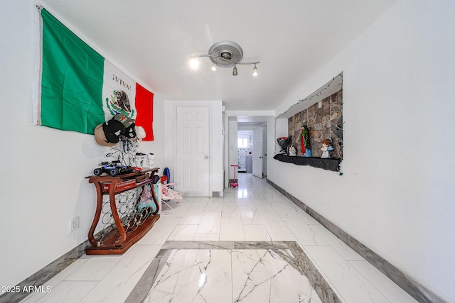 5239 W Maryland Ave, Glendale, AZ 85301 - hall featuring marble finish flooring and baseboards