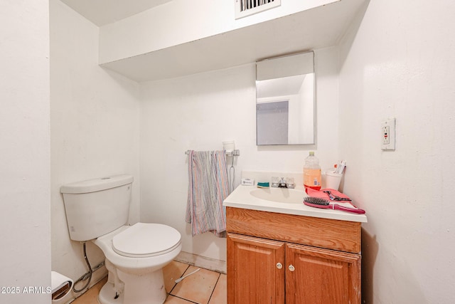 5239 W Maryland Ave, Glendale, AZ 85301 - bathroom with vanity, toilet, and tile patterned floors