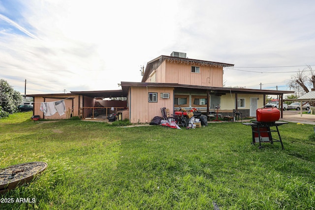 5239 W Maryland Ave, Glendale, AZ 85301 - rear view of house featuring a yard and central AC unit