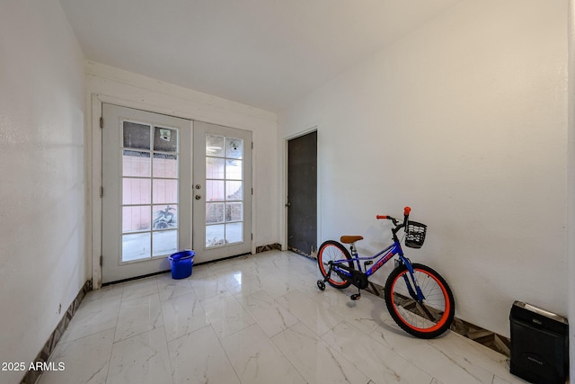 5239 W Maryland Ave, Glendale, AZ 85301 - entryway featuring french doors, light marble finish flooring, and baseboards