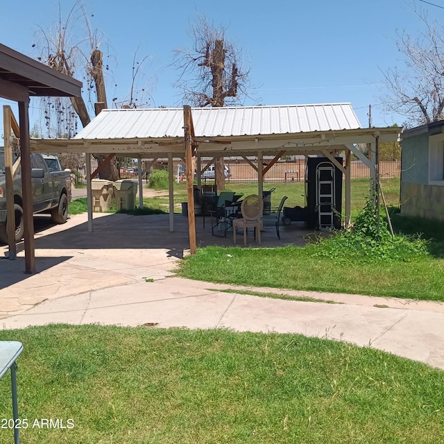 5239 W Maryland Ave, Glendale, AZ 85301 - view of patio / terrace featuring a shed and an outdoor structure