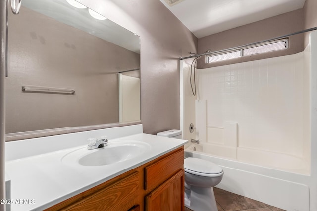 12425 W Willow Ave, El Mirage, AZ 85335 - full bath with toilet, vanity, shower / washtub combination, and tile patterned floors