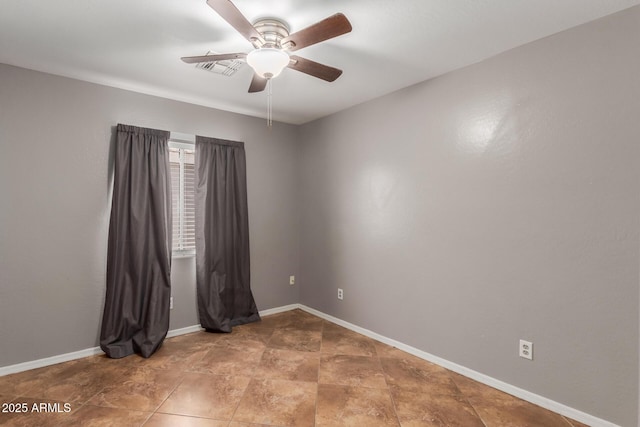 12425 W Willow Ave, El Mirage, AZ 85335 - unfurnished room featuring a ceiling fan and baseboards