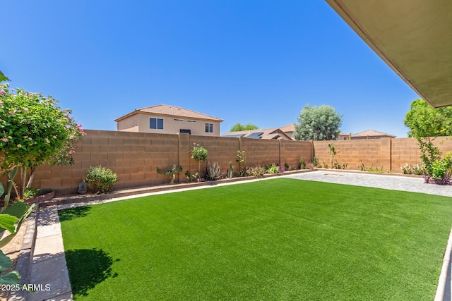 12425 W Willow Ave, El Mirage, AZ 85335 - view of yard with a patio