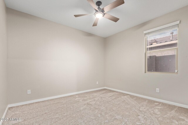 18360 W Alice Ave, Waddell, AZ 85355 - carpeted empty room with baseboards and ceiling fan