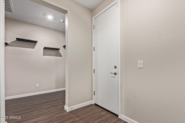 18360 W Alice Ave, Waddell, AZ 85355 - foyer with dark wood-style flooring, baseboards, and visible vents