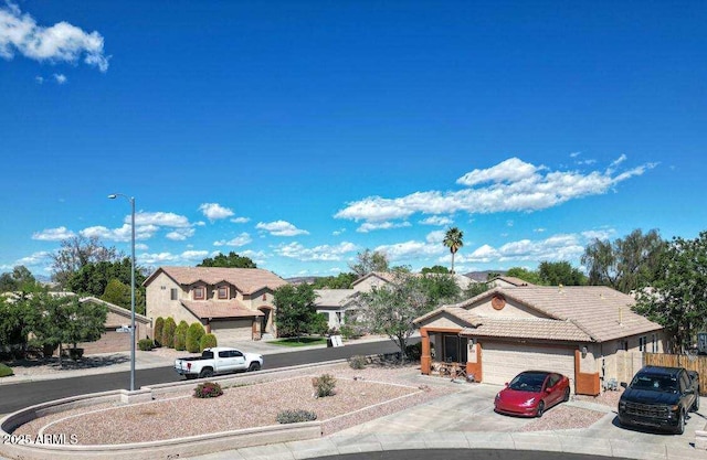 view of road with street lights, curbs, and sidewalks