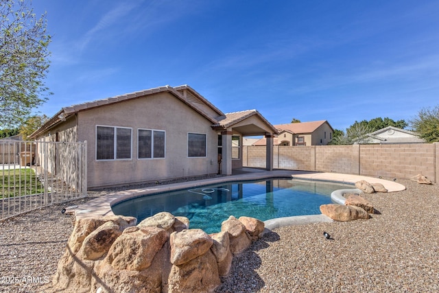 view of pool featuring a fenced backyard